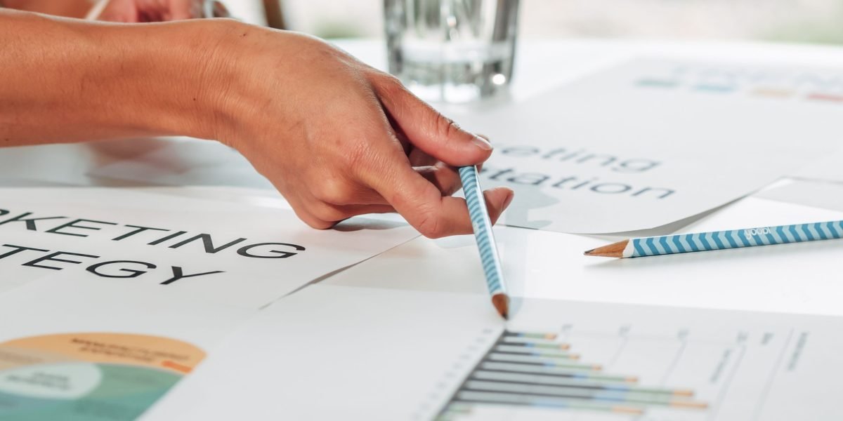 A marketing team collaborating on content strategy, emphasizing the importance of human-centric and trustworthy content for SEO and brand reputation.