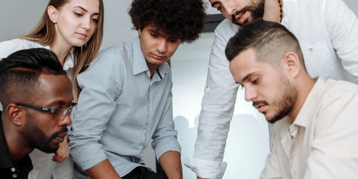 A confident and diverse team collaborating, planning for long-term success with an emphasis on ethical practices.