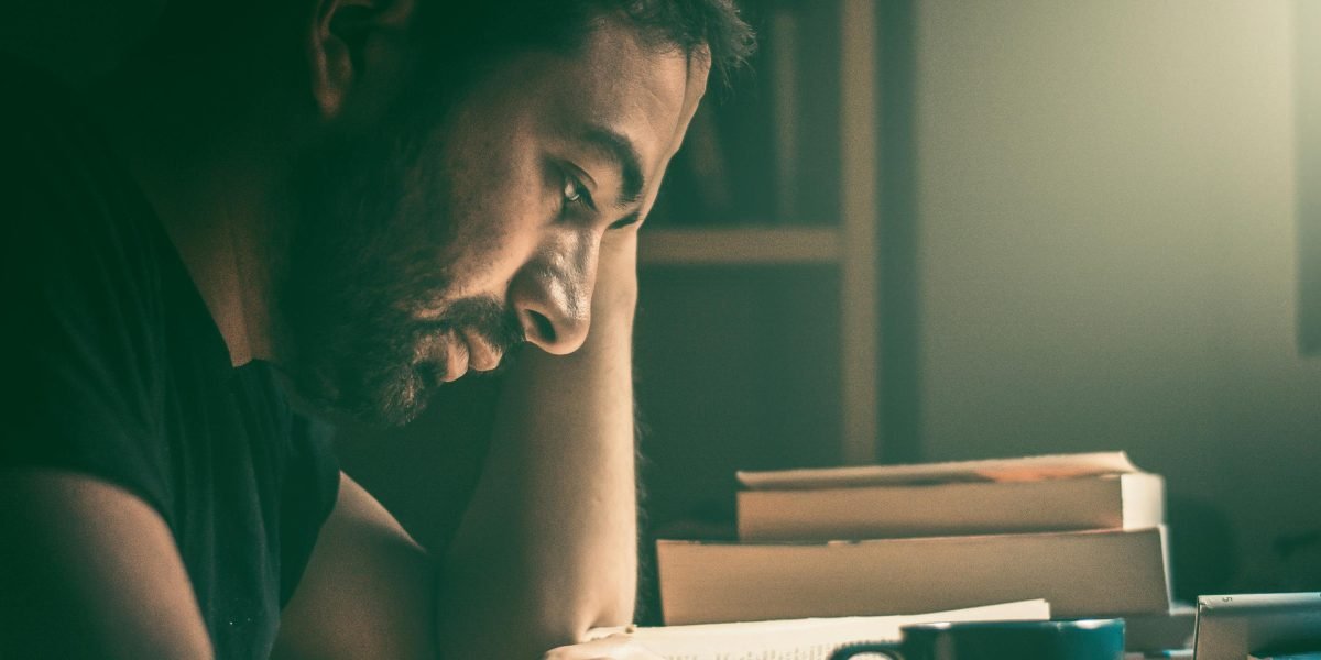 A marketing manager reviews a blog post with a subtle feeling of doubt, questioning its originality.