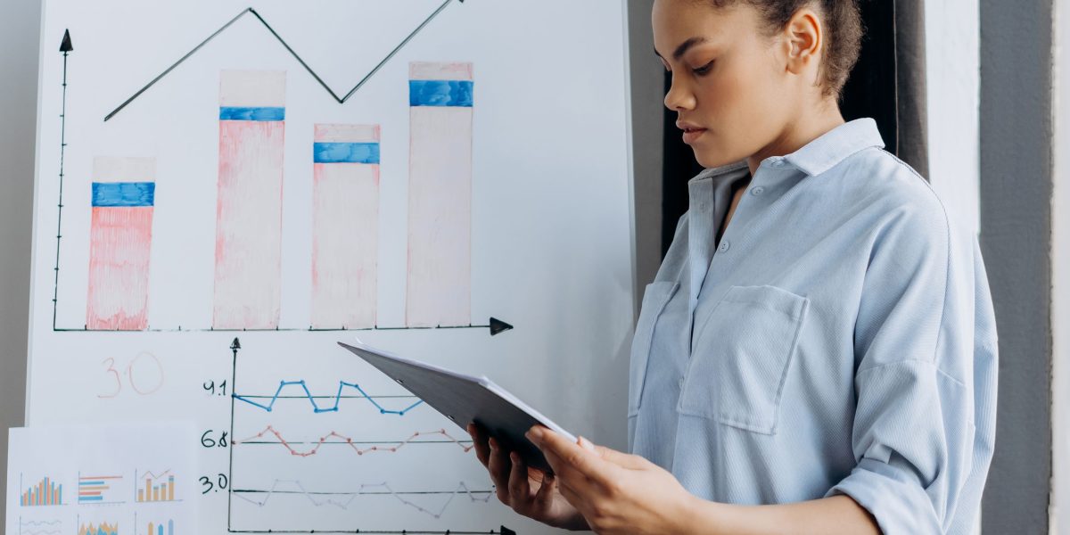 A professional focuses intently on analyzing data, reflecting the complexity of AI detection methods.