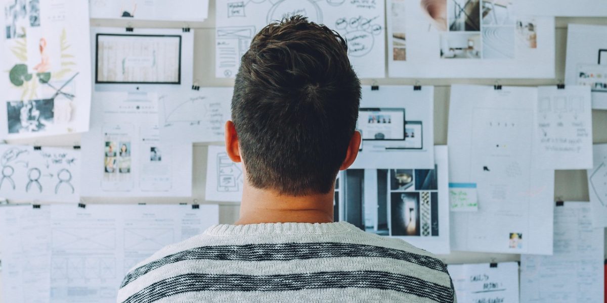 A person in a thoughtful pose, strategizing how to adapt to new challenges.