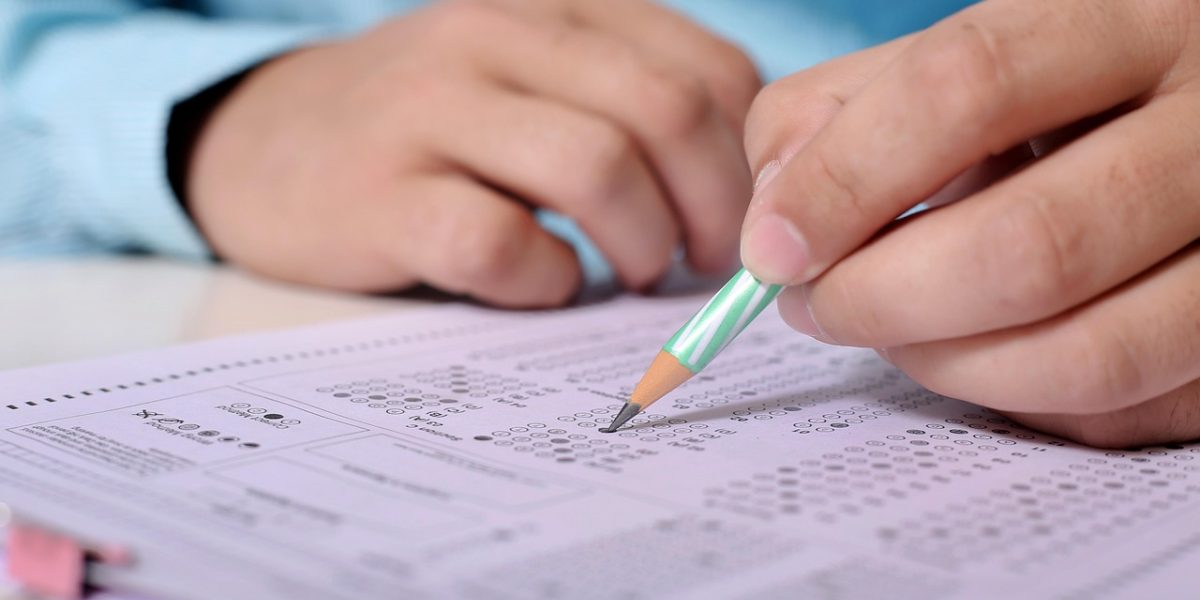 A student deeply focused on research, reflecting the challenges of academic writing and citations.