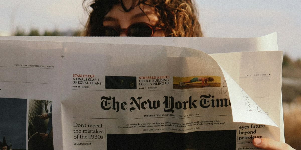 A person looking uncertain or skeptical while consuming online content, reflecting authenticity concerns.