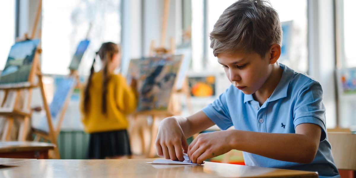 A student deeply engaged in their studies, potentially leveraging new learning aids.