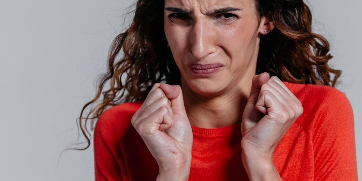 A person looking hesitant or guarded, representing the feeling of lost privacy and trust in online conversations.