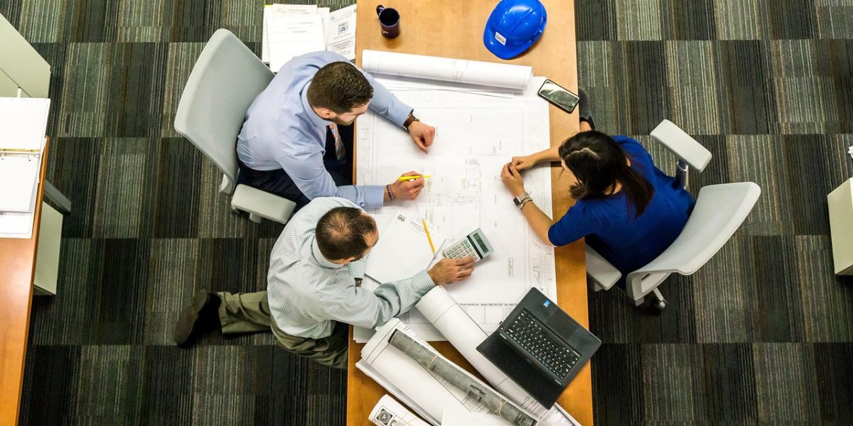 A team collaborating, emphasizing the human element in managing and integrating AI tools into workflows.