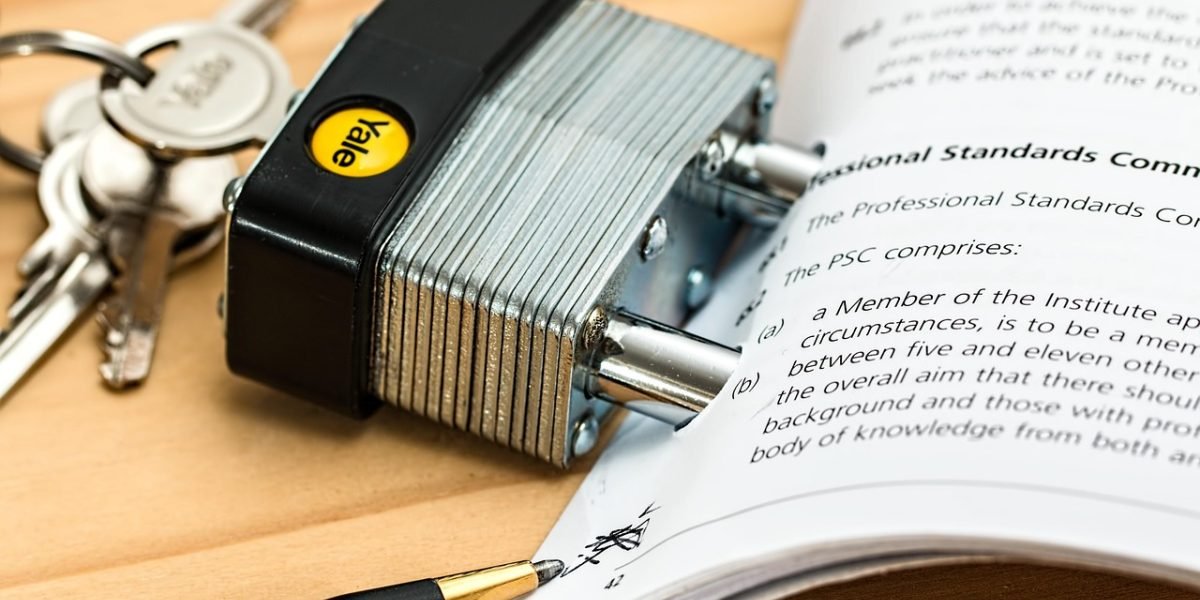 Professionals reviewing legal documents, representing the importance of compliance and legal considerations for AI-generated code.