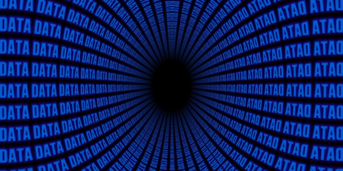 A professional meticulously reviews documents, symbolizing the challenge and importance of detecting AI-generated content.