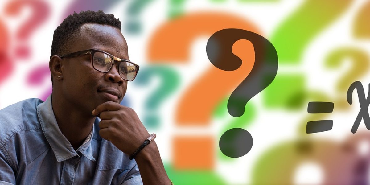 A person reflecting deeply on complex ideas, symbolizing the foundational questions behind AI.