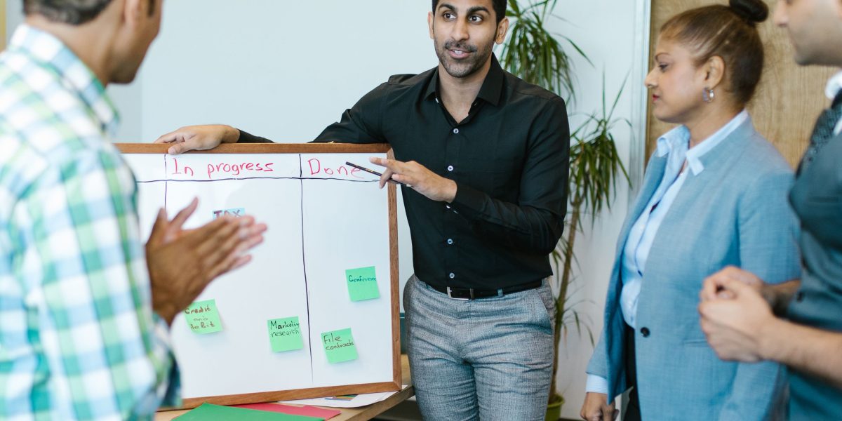 A team collaborates to define a clear strategic vision, preventing scattered efforts and ensuring AI initiatives align with core business goals.