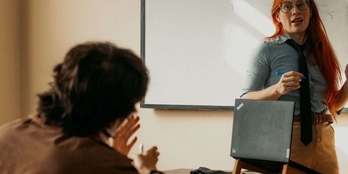 An educator and student engage in a conversation, highlighting the challenges of ensuring academic integrity in an AI-assisted era.