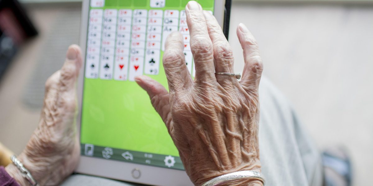 A person showing concern or frustration while reviewing results, representing the challenge of false positives in AI detection.