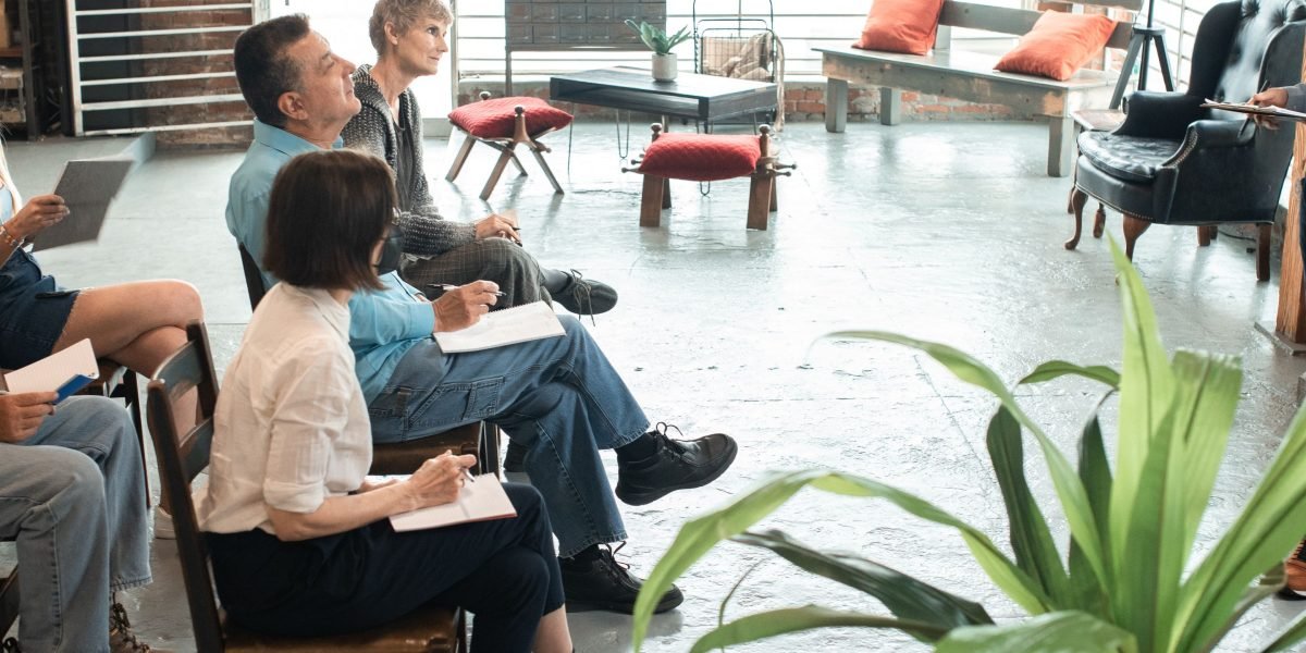 A trainer guiding a team through best practices, illustrating the importance of education for responsible AI tool use.
